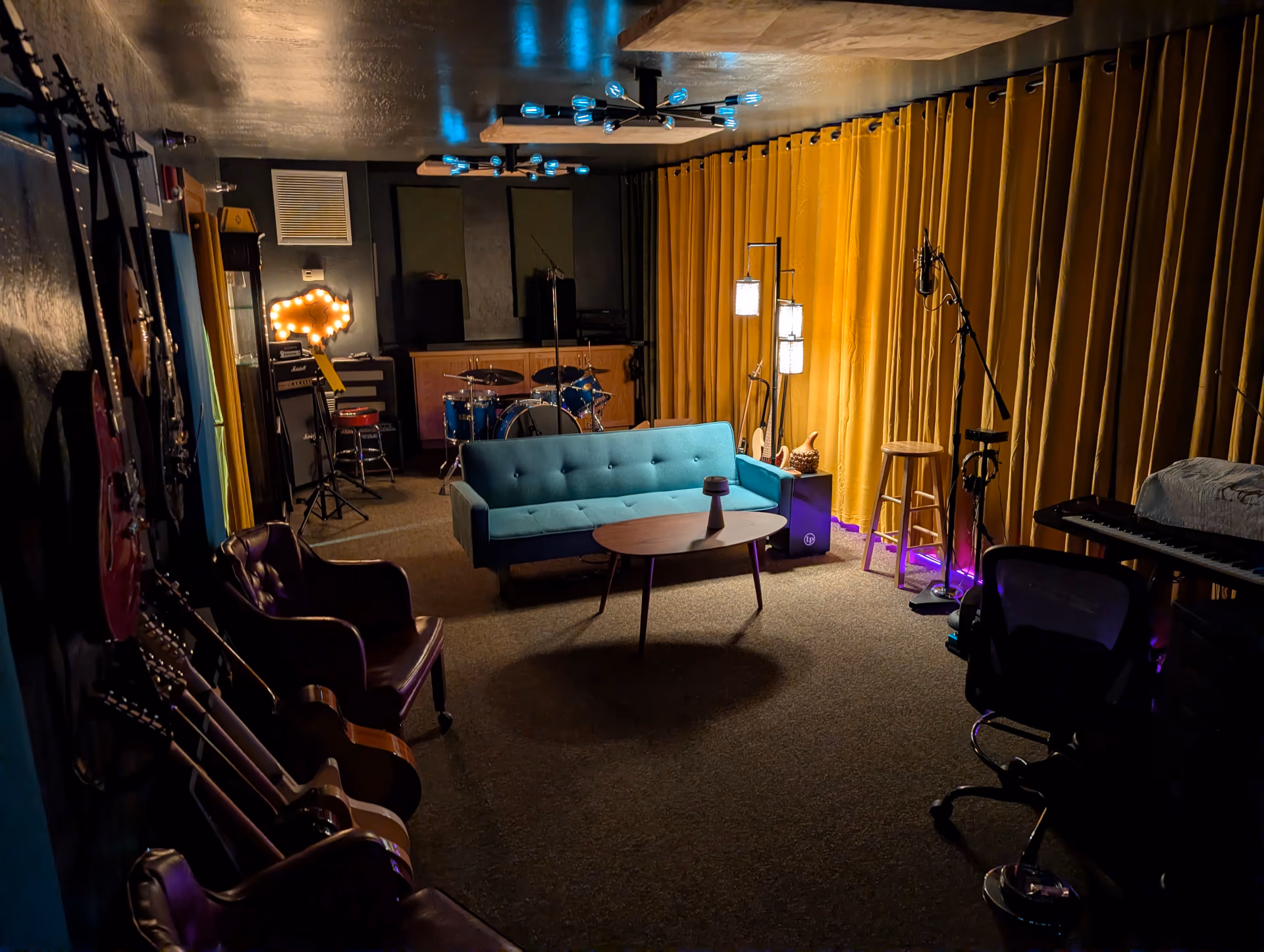 Giant Juniper Studio tracking room with instruments, microphones, and seating